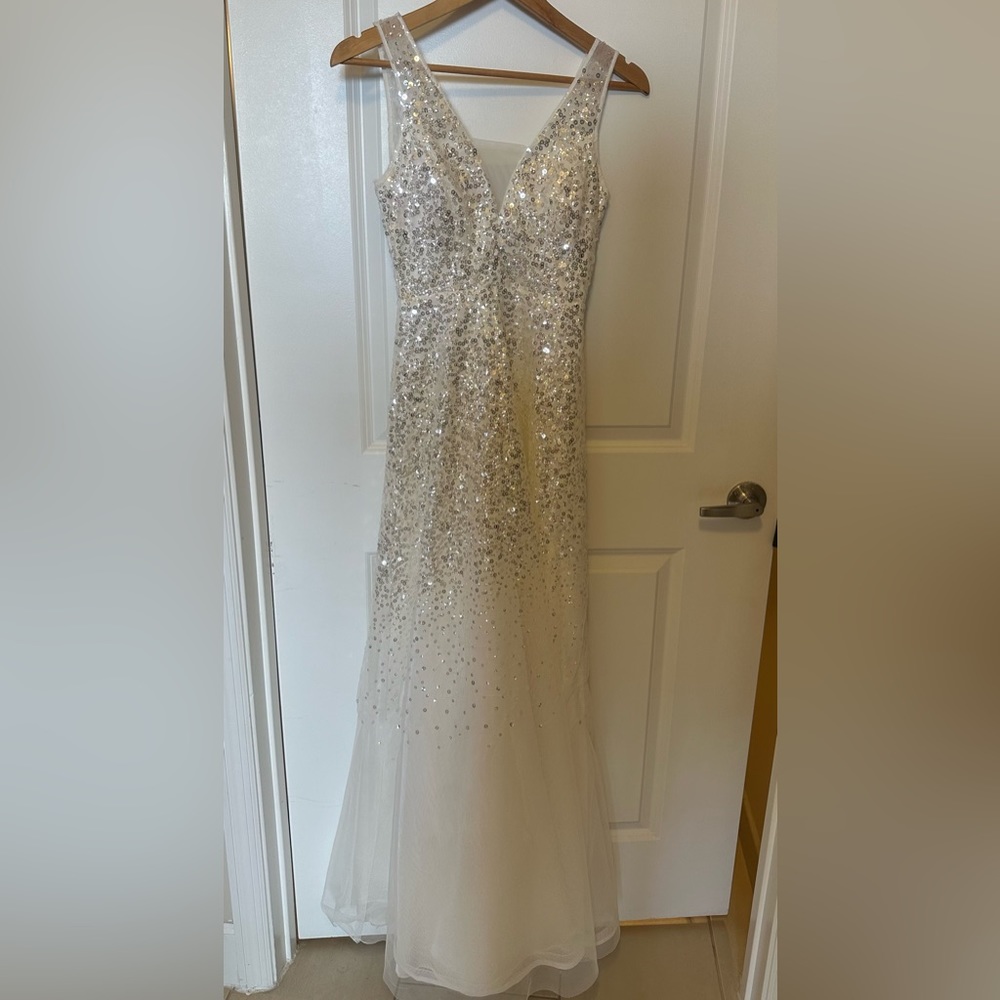 TLC Say yes to the Prom white sequin size 3/4 gown. Excellent condition.